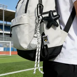 Llavero de cuero multicolor con estrella para mochila y equipaje