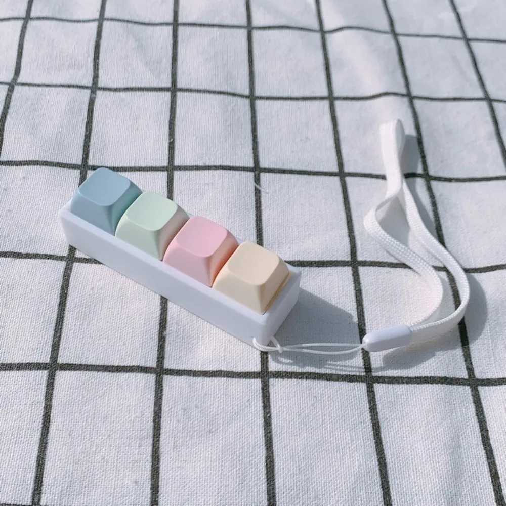 Juguete antiestrés de dedos con botones de clic y teclas – Relax
