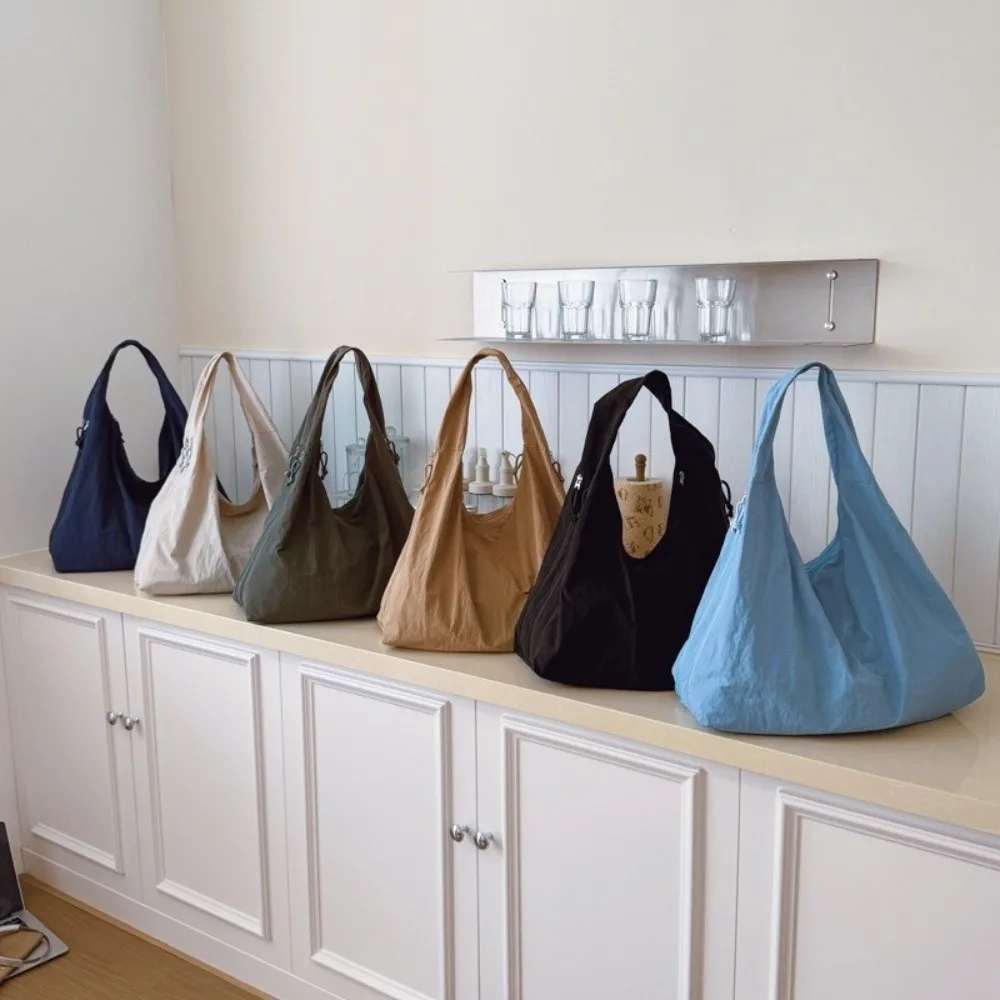 Bolso bandolera impermeable de nailon con múltiples bolsillos