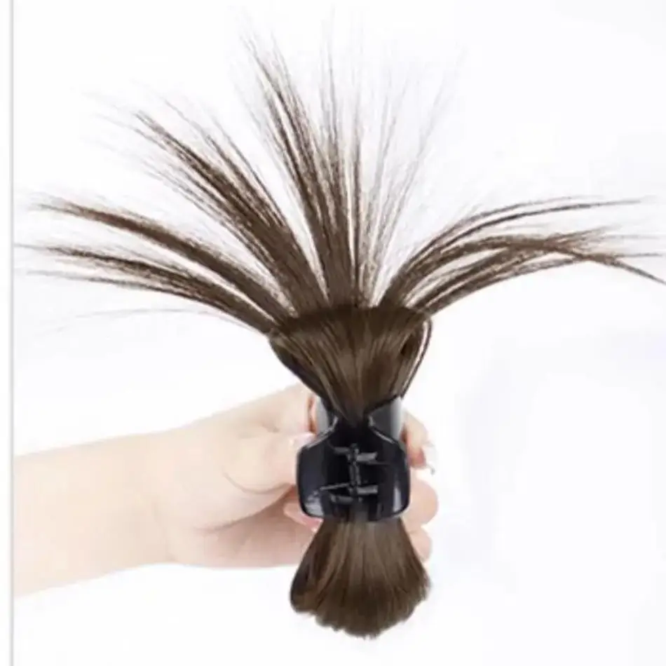 Pinza para el pelo con moño sintético liso y plumas - imagen 5