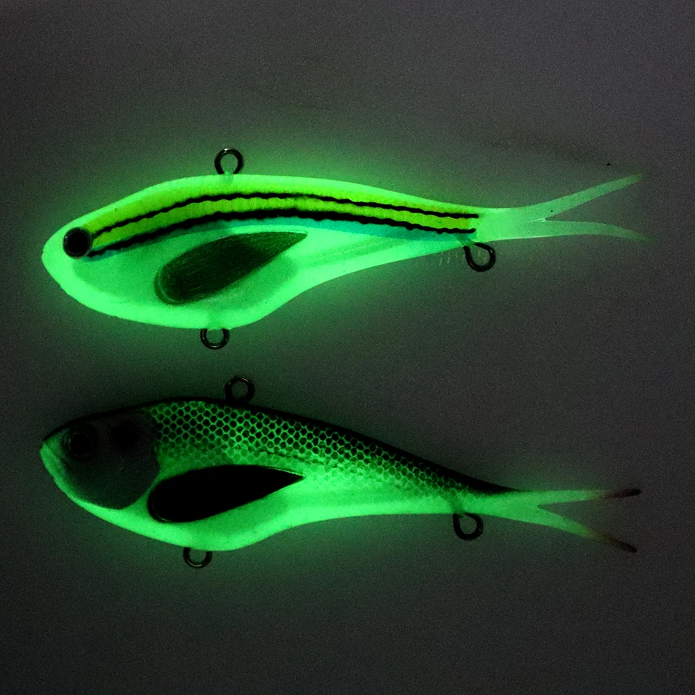 Señuelo de vibraciones con brillo UV y cola de horquilla