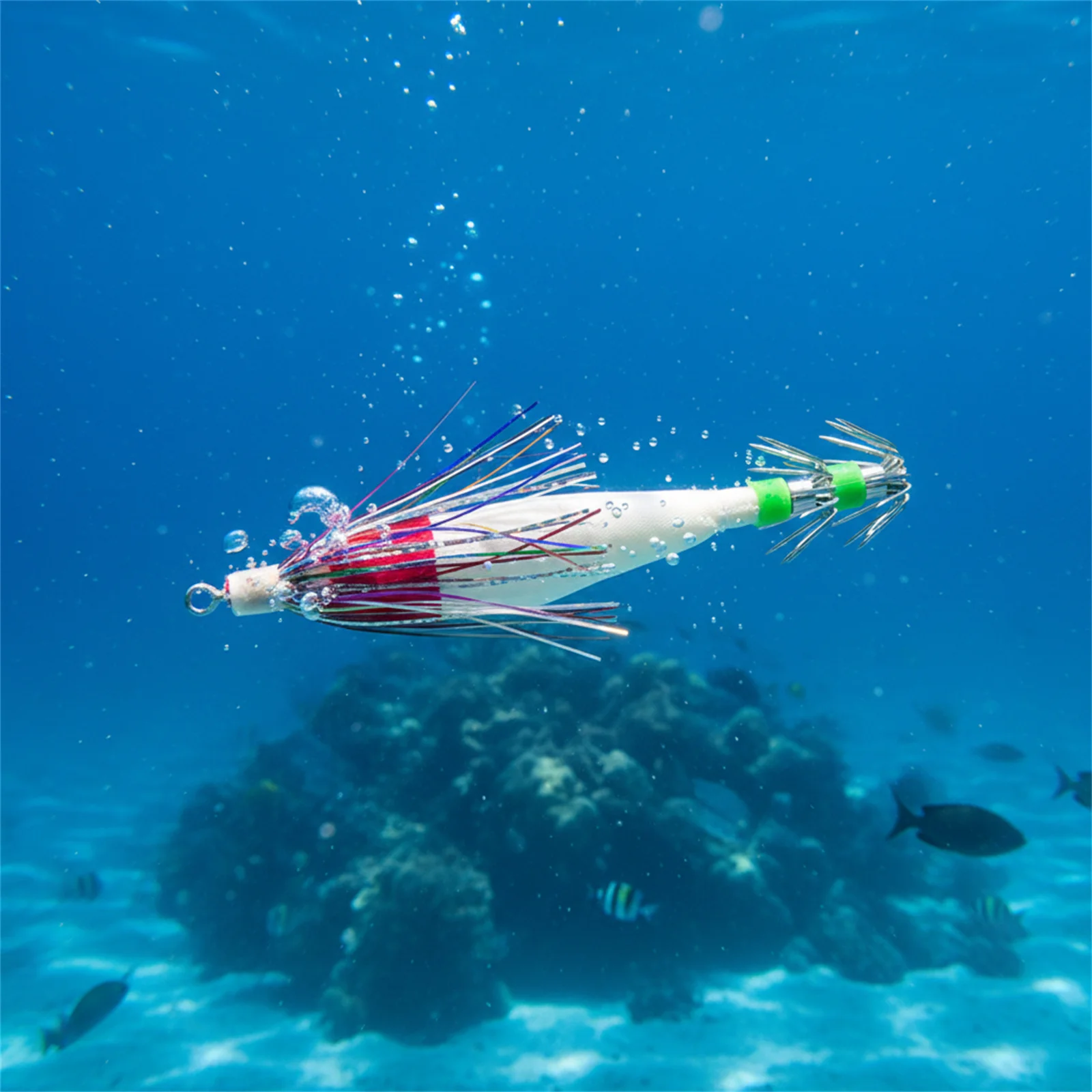 Señuelo de pesca de calamar con borlas fosforescentes
