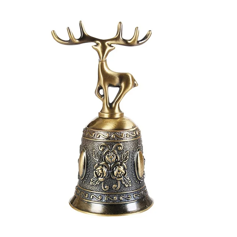 Campana de bronce decorativa con forma de mano dereno en acabado verde azulado