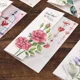 Tarjeta de felicitación navideña creativa con ramo de flores - imagen 2