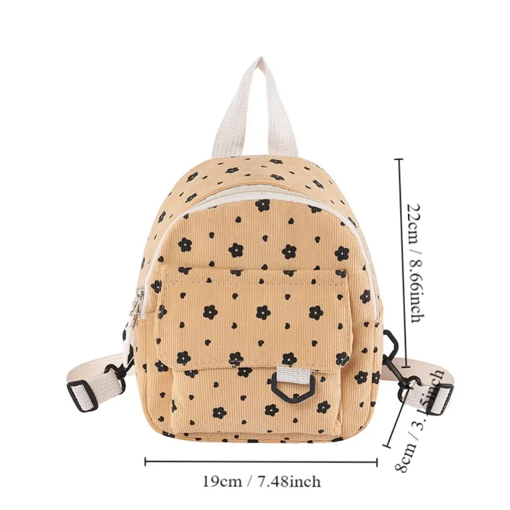 Mini mochila de pana con estampado floral en colores