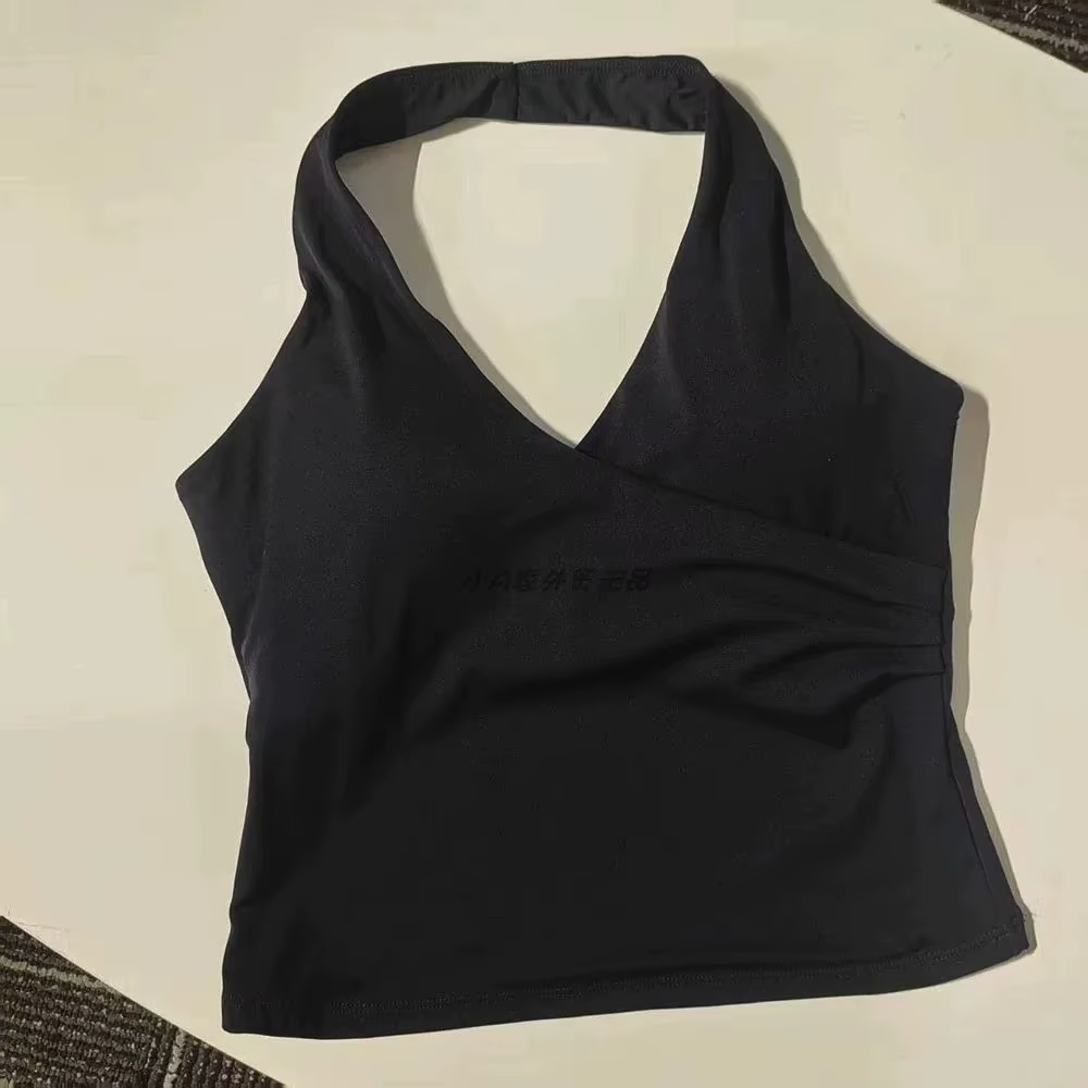Top deportivo rosa con detalle de copas